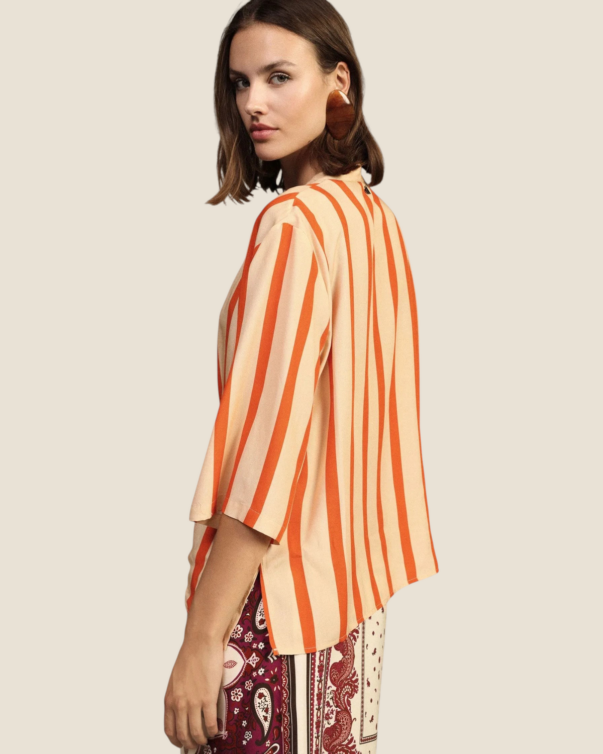 Madison Shop viscose shirt with orange and cream vertical stripes, 3/4 sleeves, and a mandarin collar.