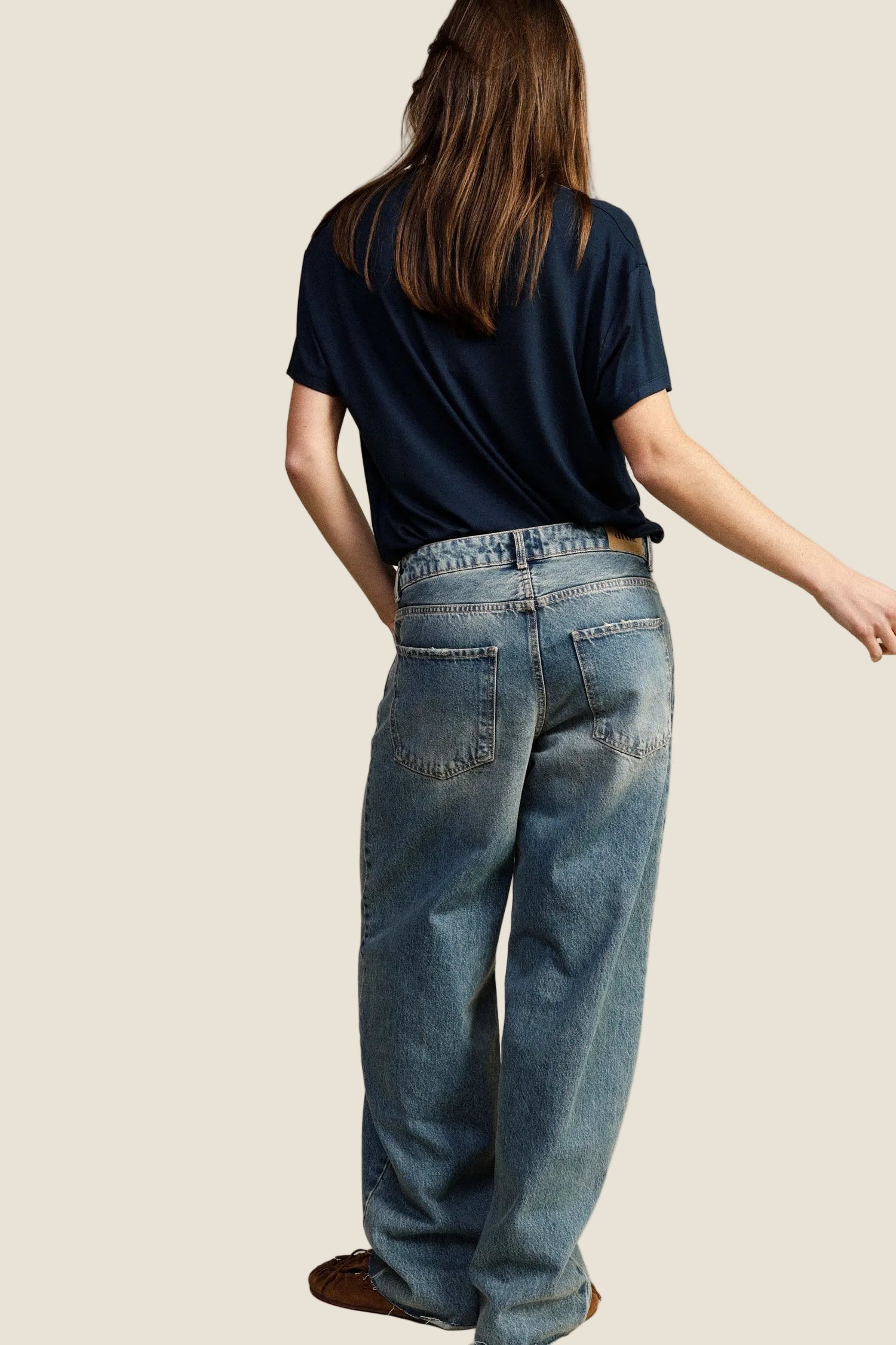 Jeans a gamba ampia vita alta con orlo vivo