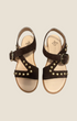 Madison Shop Helena Backer dark brown suede flat sandals with gold spherical studs and ankle strap with large buckle.