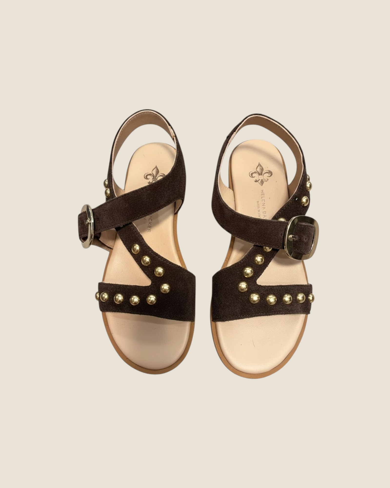 Madison Shop Helena Backer dark brown suede flat sandals with gold spherical studs and ankle strap with large buckle.