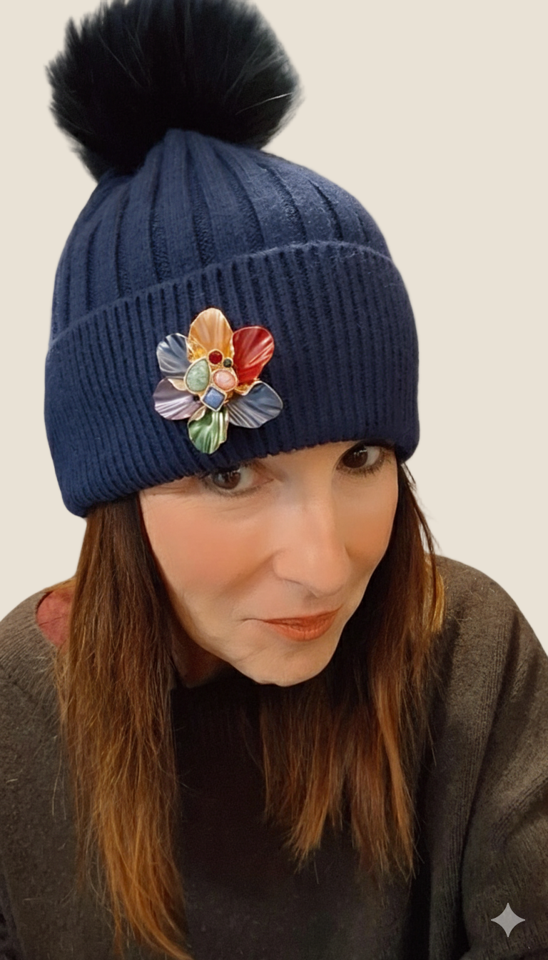 Madison cuffie morbide con spilla