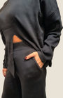 Completo in maglia nero Madison Shop con dolcevita e apertura frontale, pantalone a gamba ampia e vestibilità morbida