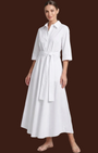Abito camicia lungo bianco in cotone con cintura in vita Madison Shop, elegante e fluido per cerimonie estive.