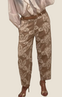 Madison Shop straight leg trousers in beige with white floral embroidery and a brown belt, styled with a white blouse.