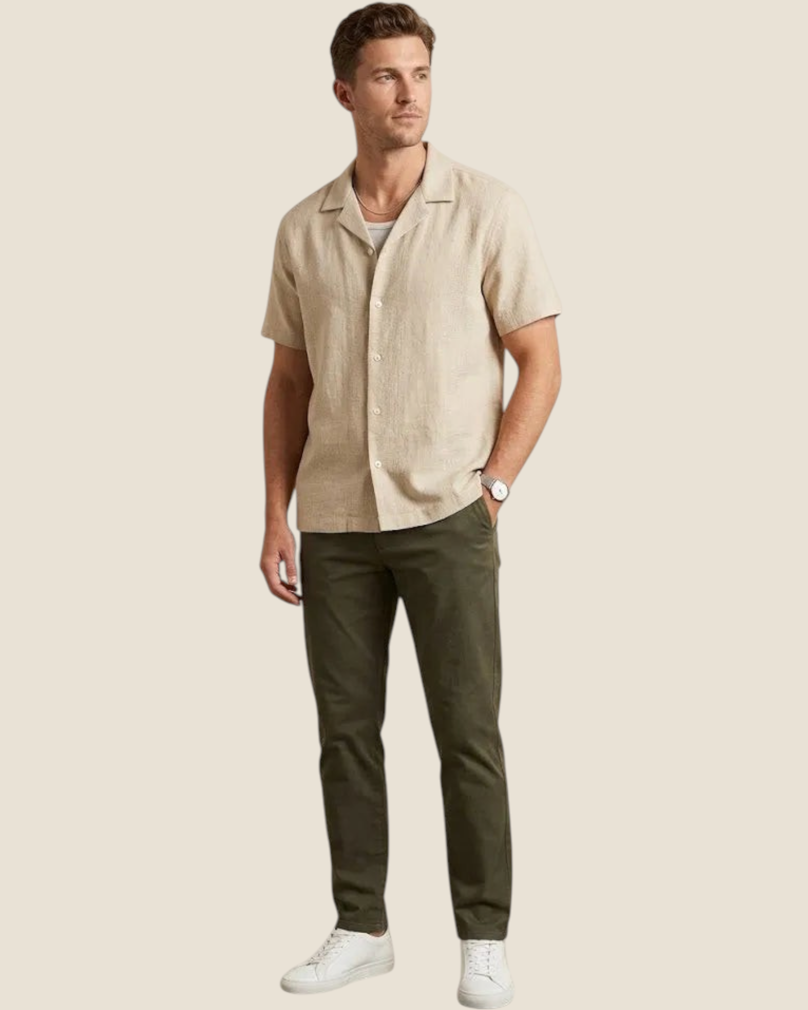 Madison Shop beige short-sleeve shirt with a camp collar, worn by a man with olive trousers and white sneakers.