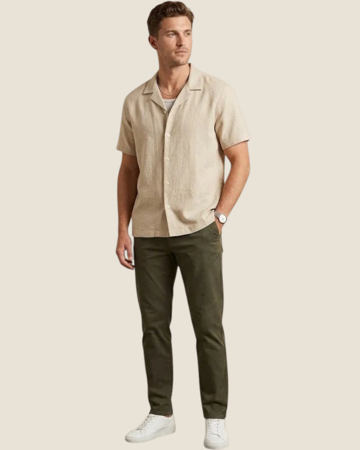 Madison Shop beige short-sleeve shirt with a camp collar, worn by a man with olive trousers and white sneakers.
