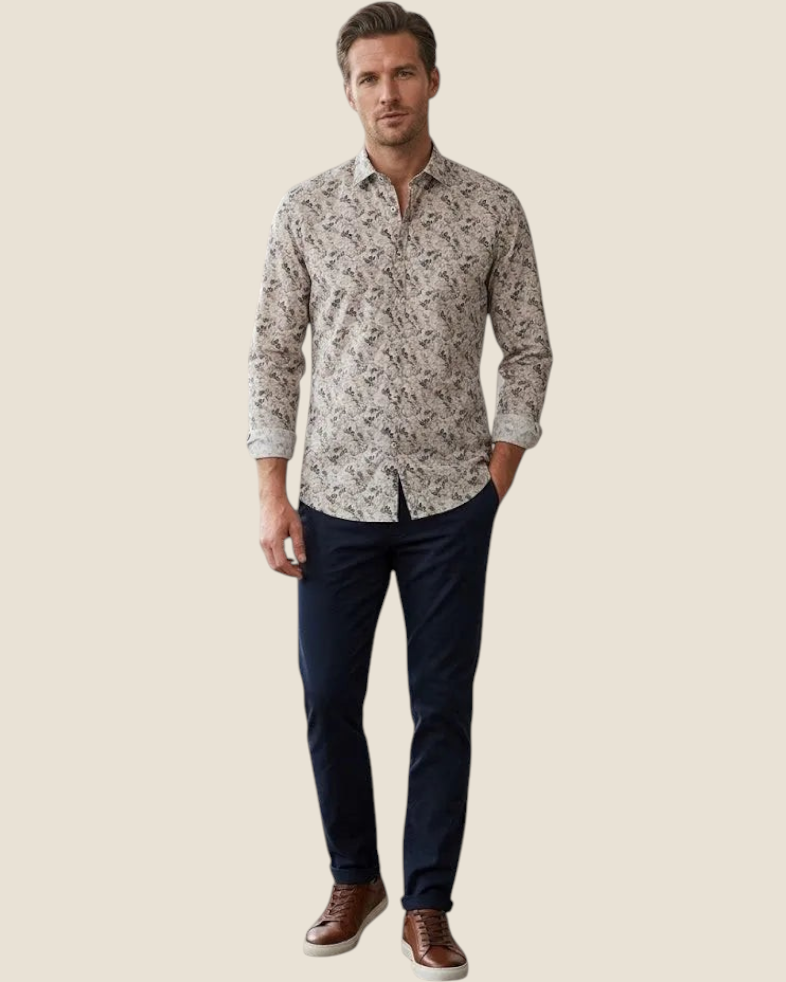 Madison Shop slim fit shirt in earth-toned all-over print cotton and linen blend worn by a man with navy trousers.