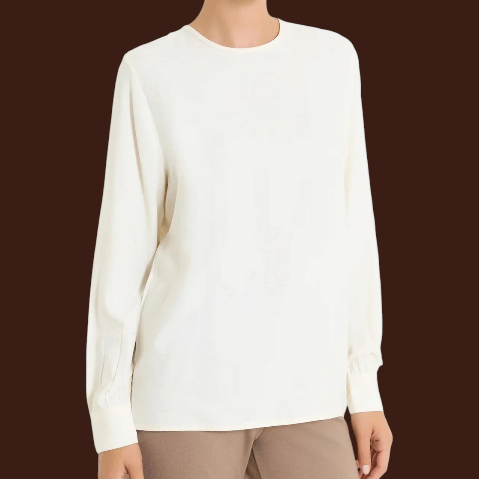 Blusa girocollo Madison Shop in viscosa color avorio con maniche lunghe e polsini abbottonati, vestibilità regular.