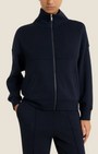 Giacchina Madison Shop in scuba blu navy con zip frontale, collo alto e tasche laterali, vestibilità morbida