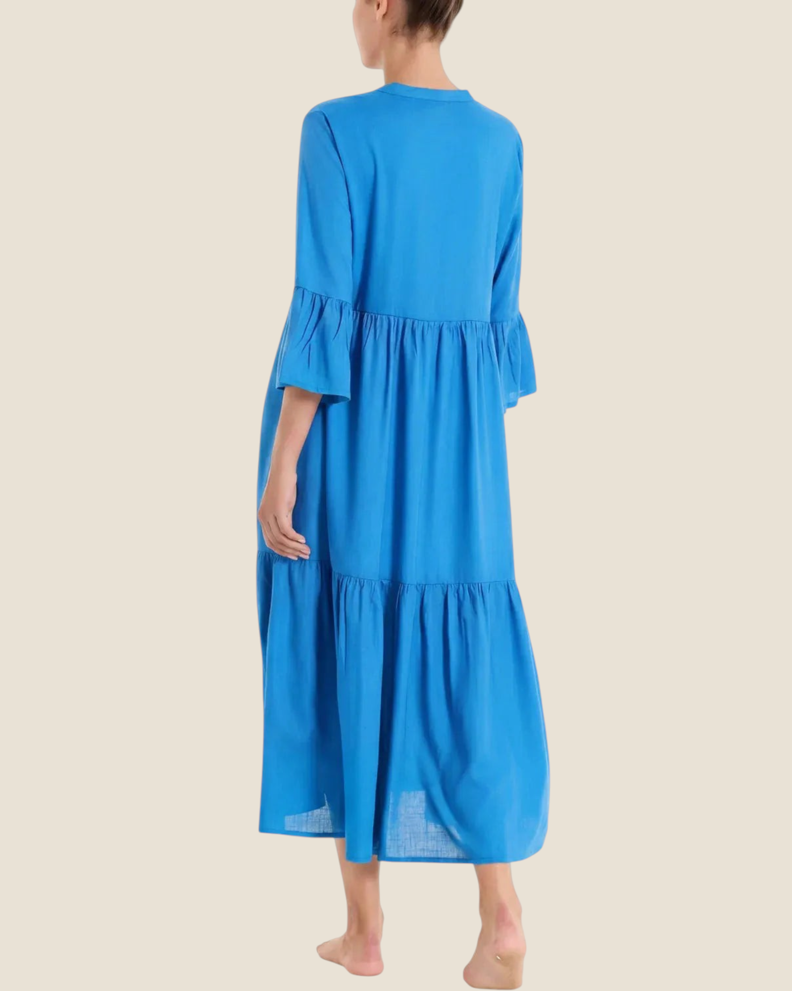Madison Shop blue long tiered dress in slub muslin viscose with elbow-length ruffled sleeves, back view