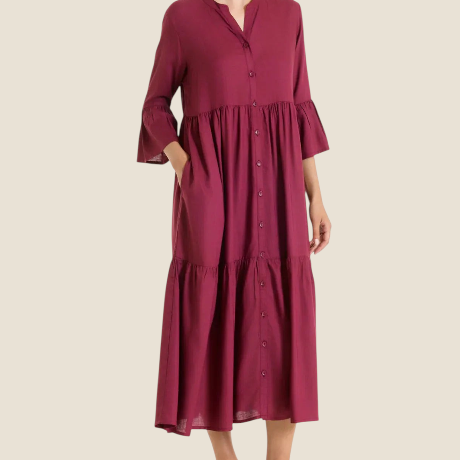 Madison Shop Ragno long burgundy viscose slub dress with button front, elbow-length ruffled sleeves, and side pockets.