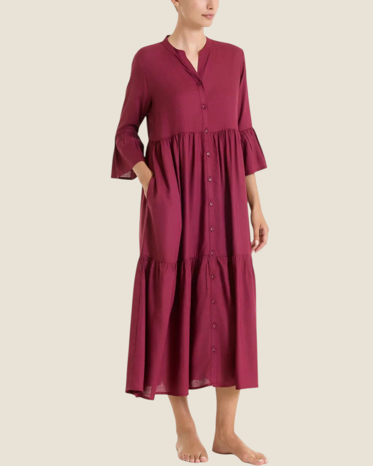 Madison Shop Ragno long burgundy viscose slub dress with button front, elbow-length ruffled sleeves, and side pockets.