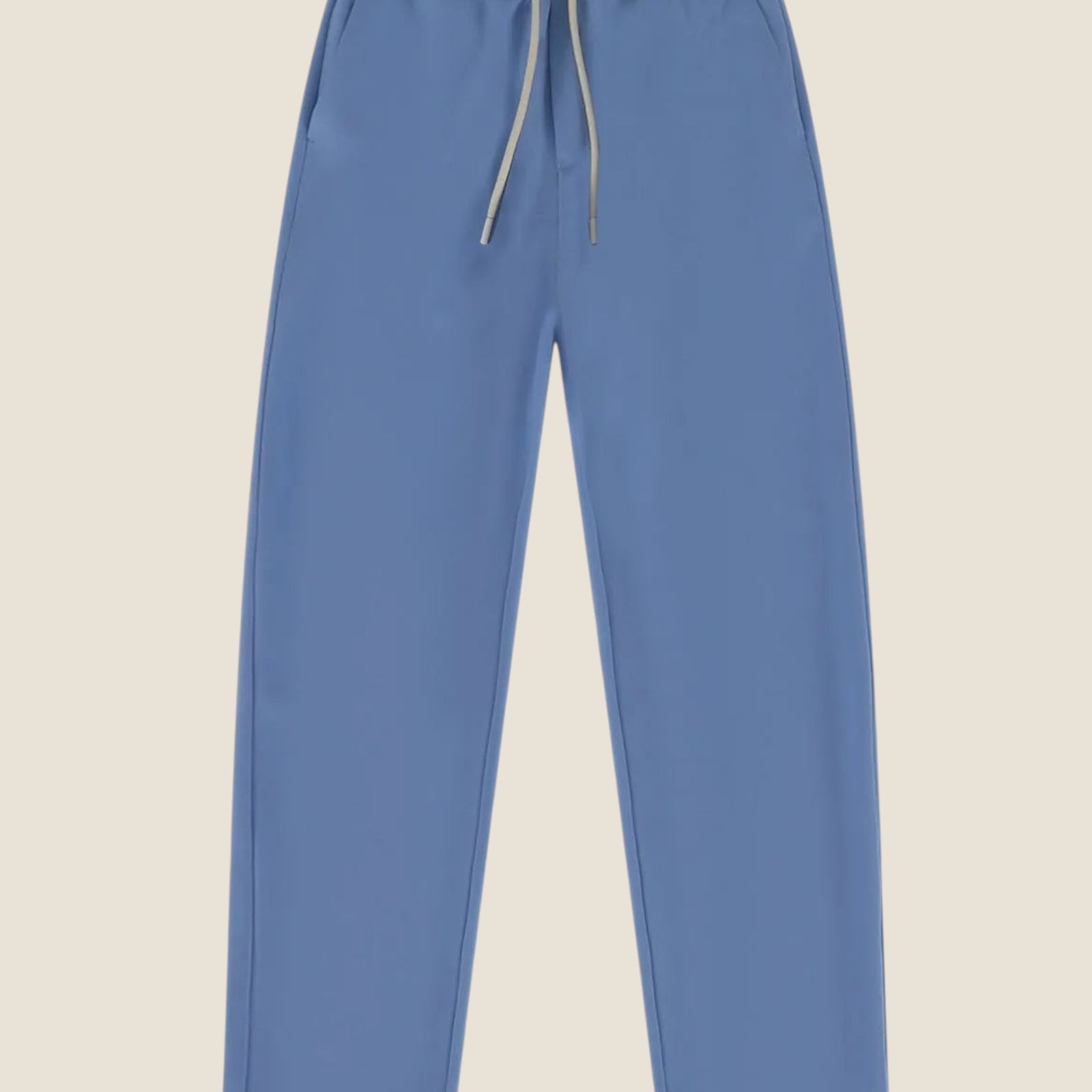 Madison Shop Over/D slim fit blue chino jogger pants with an elasticated drawstring waist in a polyester blend.