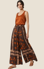 Madison Shop Dafne high-waisted wide-leg trousers in brown floral viscose with a matching belt on a model
