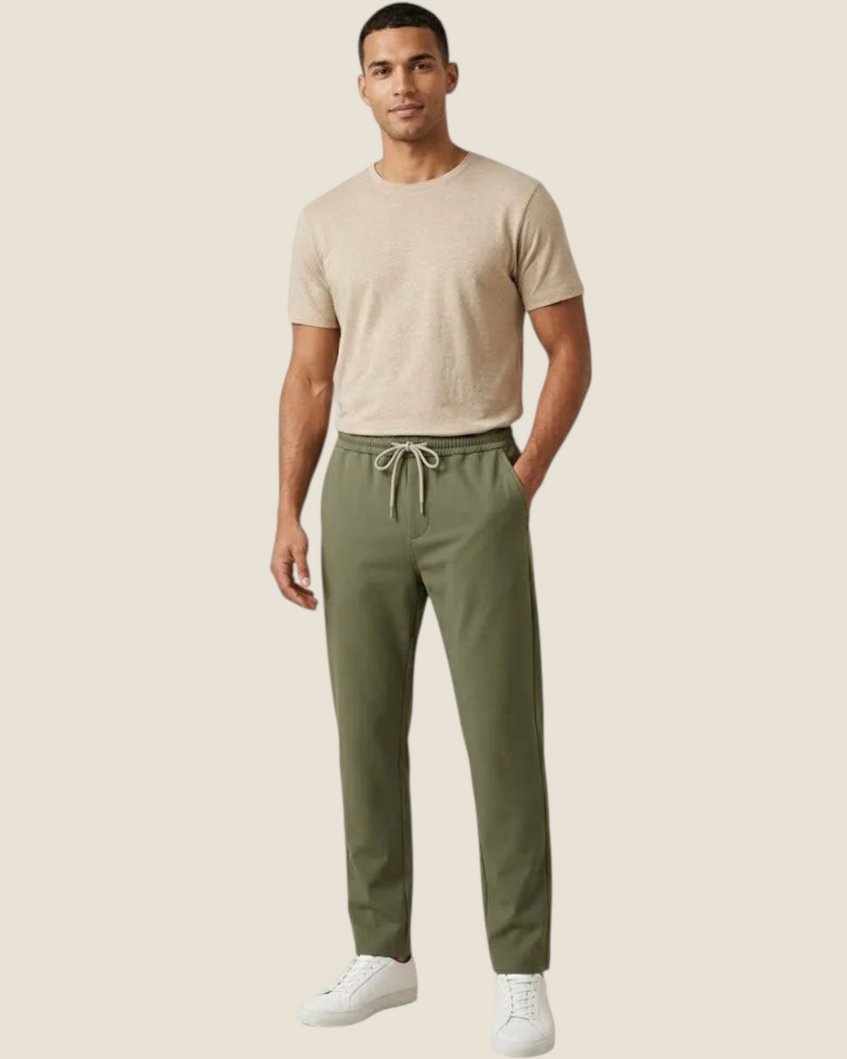 Madison Shop Over/D slim fit olive green chino jogger pants with elastic drawstring waist on a male model
