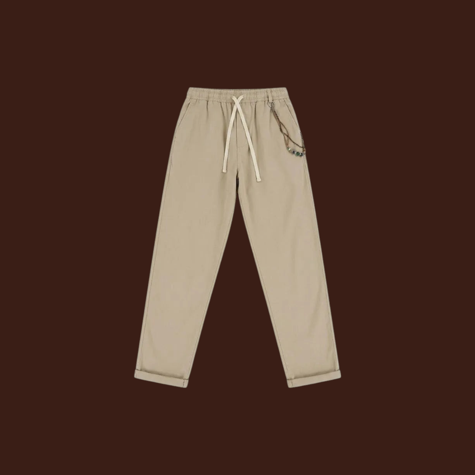 Madison Shop Over/D relaxed fit chino pants in beige cotton blend with elastic drawstring waist and chain detail.