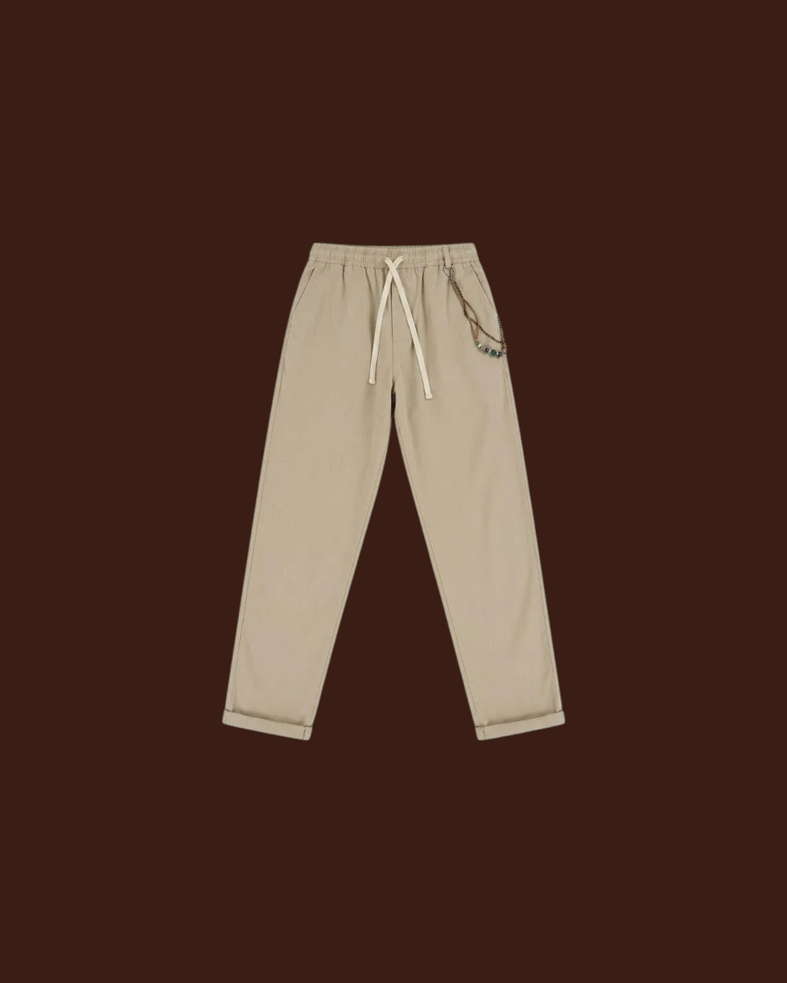 Madison Shop Over/D relaxed fit chino pants in beige cotton blend with elastic drawstring waist and chain detail.