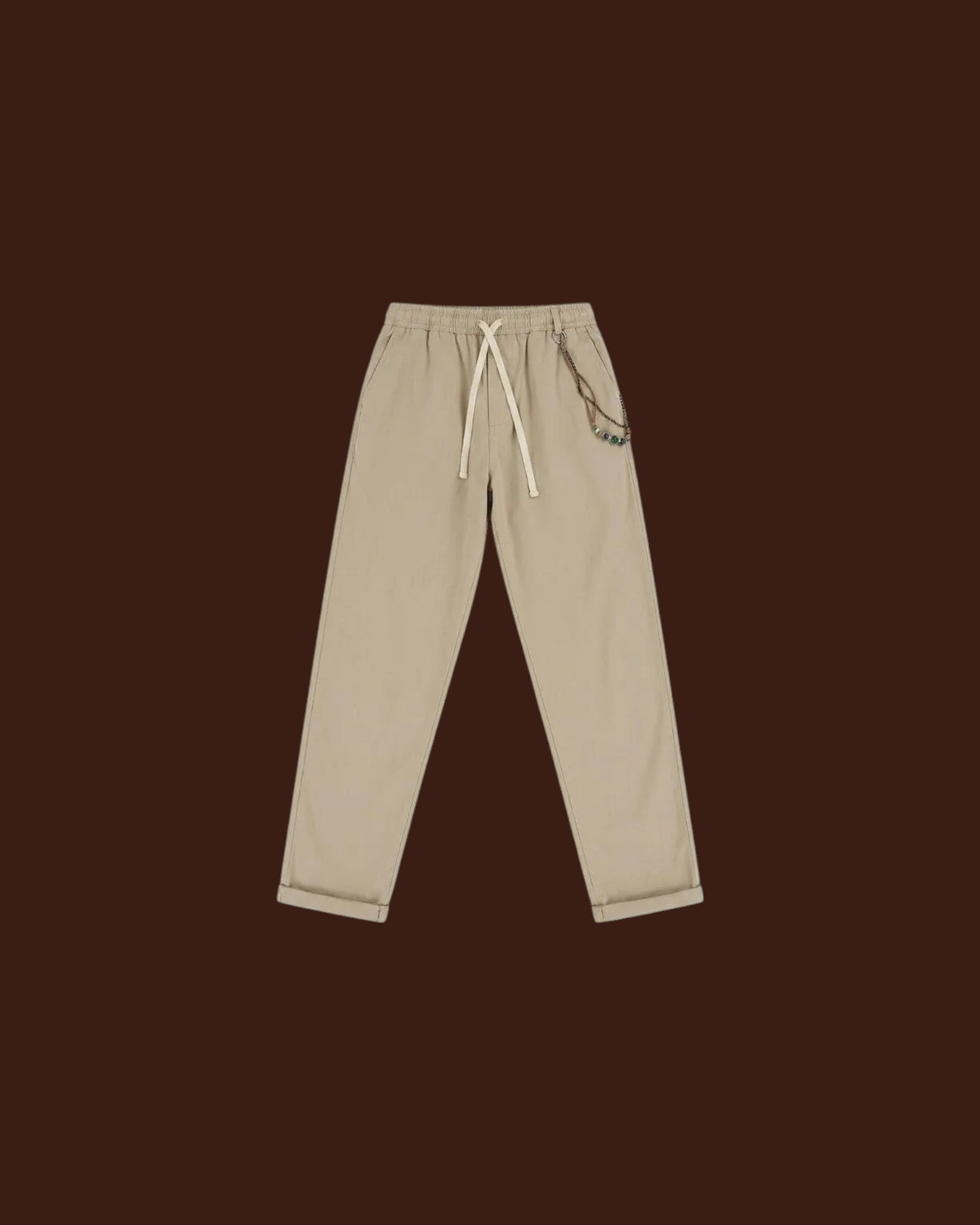 Madison Shop Over/D relaxed fit chino pants in beige cotton blend with elastic drawstring waist and chain detail.