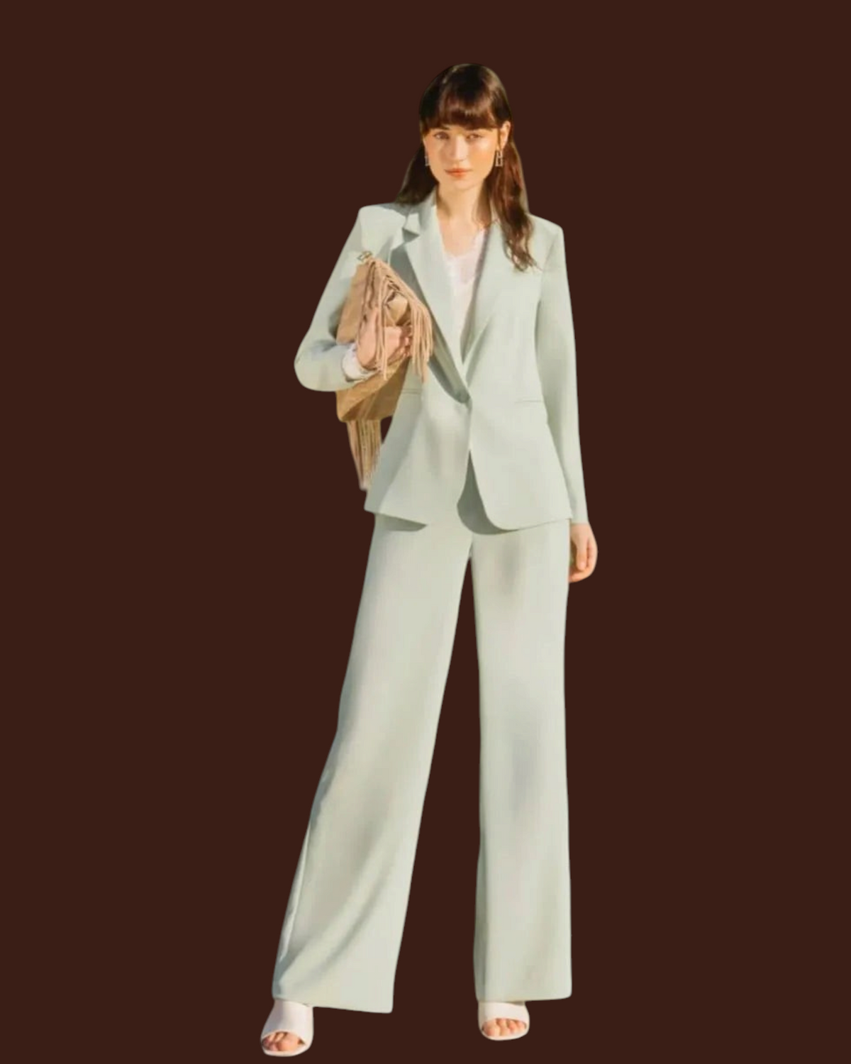 Modella indossa completo Madison Shop verde menta con giacca a un bottone e pantaloni wide-leg in tessuto fluido